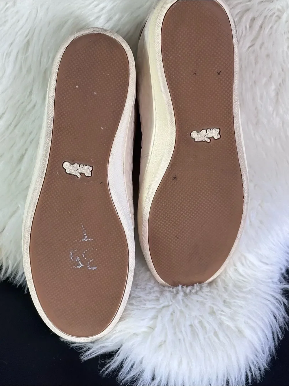 Coach Women's cream leather Signature Embossed Sneakers